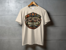 Load image into Gallery viewer, Cream t-shirt with "Home Brew Radio Club" logo featuring vintage radio parts.