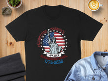Load image into Gallery viewer, Black t-shirt with "CELEBRATING AMERICA'S SEMIQUCENTENNIAL 1776-2026" and American flag Statue of Liberty graphic.