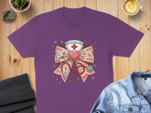 Load image into Gallery viewer, Purple t-shirt with stethoscope, heart, and "XOXO" bow graphic.