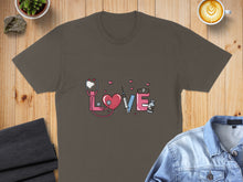 Load image into Gallery viewer, Brown t-shirt with stethoscope, heart, syringe, and medical vial forming the word "LOVE".
