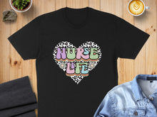 Load image into Gallery viewer, Black t-shirt with "Nurse Life" heart graphic in leopard print and colorful floral accents.