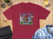 Load image into Gallery viewer, Burgundy t-shirt with "Lovin' that nurse life" graphic.