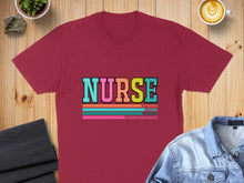 Load image into Gallery viewer, Maroon t-shirt with "NURSE" text and stripes, "Strong Loyal Caring Compassionate" below.