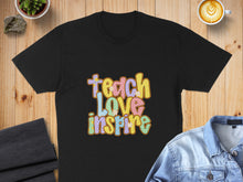 Load image into Gallery viewer, Black t-shirt with "Teach Love Inspire" text in colorful retro lettering.