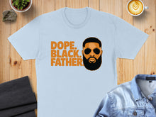 Load image into Gallery viewer, Light blue t-shirt with "DOPE. BLACK. FATHER." text and a man's illustrated face.