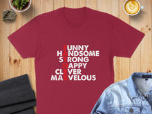 Load image into Gallery viewer, Maroon t-shirt with white text: FUNNY, HANDSOME, HAPPY, CLEVER, STRONG, AMAZING