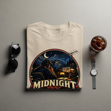 Load image into Gallery viewer, T-shirt with graphic of man using radio equipment at night, text "MIDNIGHT DX".