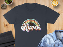 Load image into Gallery viewer, Dark t-shirt with "Nurse" text and pastel rainbow design.