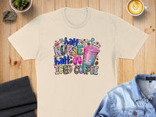 Load image into Gallery viewer, Cream t-shirt with "half nurse half iced coffee" text and graphics.