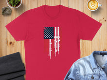 Load image into Gallery viewer, Red t-shirt with distressed American flag and rifle graphic.