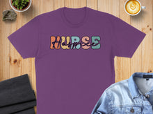 Load image into Gallery viewer, Purple t-shirt with "Nurse" text in colorful retro font.
