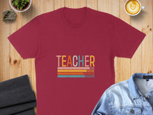 Load image into Gallery viewer, Maroon t-shirt with colorful horizontal stripes and text: Teacher, Love, Inspire, Motivator, Educator.
