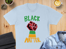 Load image into Gallery viewer, Light blue t-shirt with "BLACK FATHER MATTER" text and raised fist graphic.