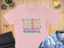 Load image into Gallery viewer, Pink t-shirt with "Strong Beautiful Supportive Blessed Wonderful" text and medical symbols.