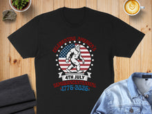 Load image into Gallery viewer, Black t-shirt with "Celebrating America's Semiquincentennial 1776-2026" and Bigfoot graphic.