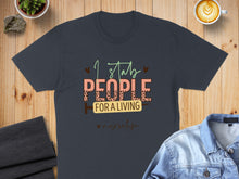Load image into Gallery viewer, Dark t-shirt with "I stab people for a living" and "#nurselife" text.