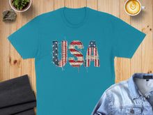 Load image into Gallery viewer, Teal t-shirt with distressed "USA" graphic featuring American flag design.