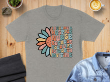 Load image into Gallery viewer, T-shirt with "I became a hospice nurse because your life is worth my time" text and flower graphic.