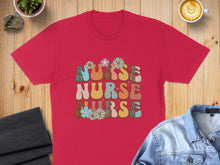 Load image into Gallery viewer, Red t-shirt with "Nurse Nurse Nurse" in groovy font and floral accents.