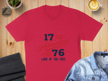 Load image into Gallery viewer, Red t-shirt with "1776 America Land of the Free" graphic.