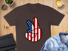 Load image into Gallery viewer, Brown t-shirt with a peace sign graphic featuring the American flag.