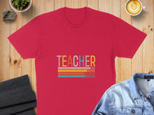 Load image into Gallery viewer, Red t-shirt with colorful "TEACHER" text and "LOVE INSPIRE MOTIVATOR EDUCATOR" below.