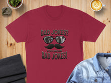 Load image into Gallery viewer, Maroon t-shirt with "Dad Jokes? You Mean Rad Jokes!" graphic.