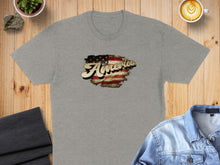 Load image into Gallery viewer, Gray t-shirt with distressed "America" flag graphic, flat lay with denim jacket.