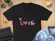 Load image into Gallery viewer, Black t-shirt with pink stethoscope, heart, syringe, and medical bottles graphic.