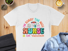 Load image into Gallery viewer, White t-shirt with "I'm sorry the nice nurse is on vacation" text and medical icons.