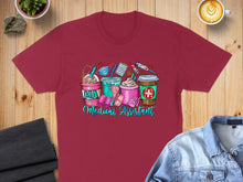 Load image into Gallery viewer, Maroon t-shirt featuring "Medical Assistant" with coffee cups and medical symbols.