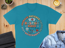 Load image into Gallery viewer, Teal t-shirt with "Courage, Patience, Compassion, Love, Nurse Life, Caffeine" text and medical symbols.