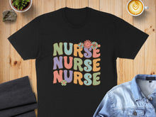 Load image into Gallery viewer, Black t-shirt with "NURSE NURSE NURSE" in colorful retro lettering and flowers.