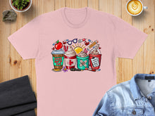 Load image into Gallery viewer, T-shirt with cartoon coffee cups and nursing supplies, reads "School Nurse Fuel".