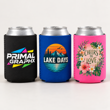 Load image into Gallery viewer, Illustrative mockup of black, royal blue and neon pink foam can coolers with sample full-color artwork