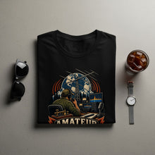 Load image into Gallery viewer, Black t-shirt with graphic of amateur radio operator, radio equipment, and globe.