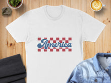 Load image into Gallery viewer, White t-shirt with "America" in red and blue checkered lettering.