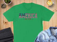 Load image into Gallery viewer, Green t-shirt with "AMERICA EST. 1776" text in patriotic colors.