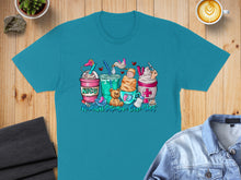Load image into Gallery viewer, NICU nurse shirt with coffee cup designs and "Neonatal Intensive Care Unit" text.