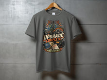 Load image into Gallery viewer, Grey t-shirt with "Upgrade Complete" graphic featuring radio and globe.