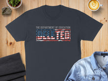 Load image into Gallery viewer, Navy t-shirt with distressed USA flag graphic and "THE DEPARTMENT OF EDUCATION" text.