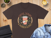 Load image into Gallery viewer, Brown t-shirt with "Coffee, Scrubs & Rubber Gloves" text and coffee cup illustration.