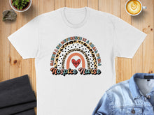 Load image into Gallery viewer, White t-shirt with "Hospice Nurse" text and rainbow graphic.