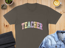 Load image into Gallery viewer, Brown t-shirt with "TEACHER" in colorful arched lettering.