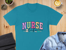 Load image into Gallery viewer, Turquoise t-shirt with "NURSE" in colorful polka dot letters and medical icons.