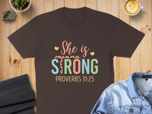 Load image into Gallery viewer, Brown t-shirt with "She is STRONG PROVERBS 31:25" text.