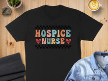 Load image into Gallery viewer, Black t-shirt with "Hospice Nurse" text in retro checkered and heart design.