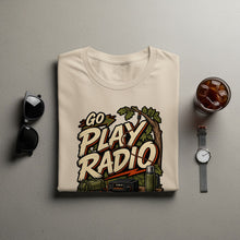 Load image into Gallery viewer, Cream t-shirt with "Go Play Radio" graphic and outdoor radio equipment.