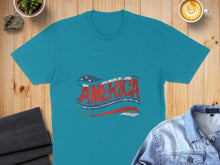 Load image into Gallery viewer, Teal t-shirt with distressed "AMERICA" text and American flag elements.