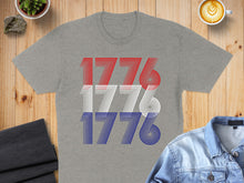 Load image into Gallery viewer, Gray t-shirt with "1776" in red, white, and blue stripes.